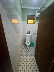 Koupelna v ubytování Bukoto suites