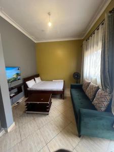 Postel nebo postele na pokoji v ubytování Pearl suites