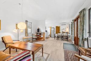 a living room with a couch and a table at FY358-Martofte-Sandvejen-3 in Martofte