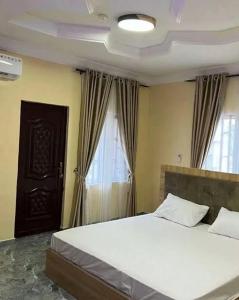 Postelja oz. postelje v sobi nastanitve De Roadmtach Hotel