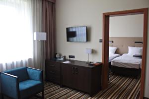 Postel nebo postele na pokoji v ubytování Hotel Victor Pruszków DeSilva