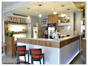 Nápoje v ubytování Hotel Monde