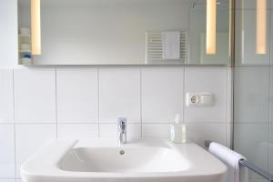 Ένα μπάνιο στο Nordsee Apartments +37 φωτογραφίες