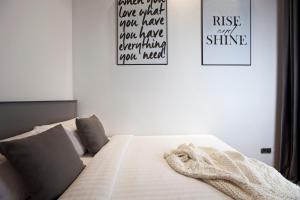 Posteľ alebo postele v izbe v ubytovaní Centric Gracia Apartments