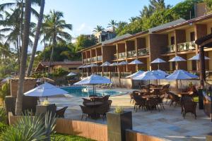 A patio or other outdoor area at Genus Beach Hotel