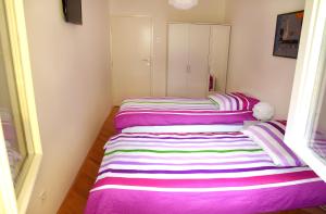 Posteľ alebo postele v izbe v ubytovaní Apartmani Vedmar