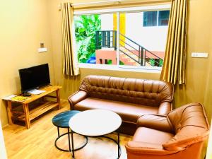 Posezení v ubytování Lucky Sky Homestay ลัคกี้สกายโฮมสเตย์