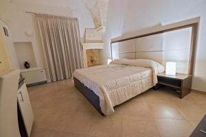 Postel nebo postele na pokoji v ubytování Monte Castello