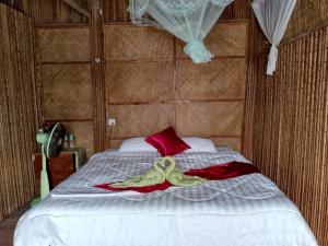 Postel nebo postele na pokoji v ubytování Tatai Natural Resort