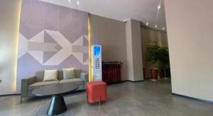 Posezení v ubytování Borrman Hotel Korla Peacock River