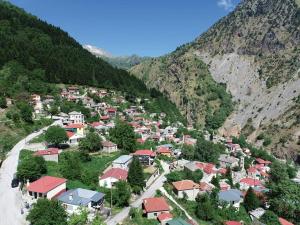 an aerial view of a village in a mountain at Family Country House in Agía Paraskeví