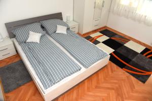 Posteľ alebo postele v izbe v ubytovaní Apartmani Vedmar