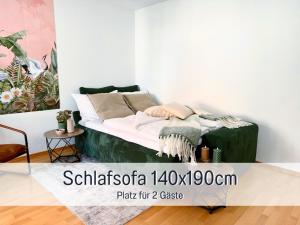 a bedroom with a bed in a room at StayWest52 - Balkon, WLAN, Parkplatz in Ulm