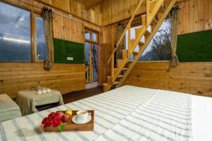 Ένα ή περισσότερα κρεβάτια σε δωμάτιο στο Moon Light Cottage