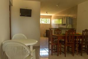 TV a/nebo společenská místnost v ubytování Privê Village Maragogi