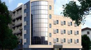 a tall building with a lot of windows at Bestay Hotel Express Nanjing Xinjiekou in Nanjing