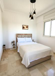 Postel nebo postele na pokoji v ubytování Signature Villa à la Plage
