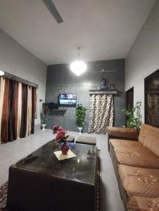 Χώρος καθιστικού στο Ramble Homestay