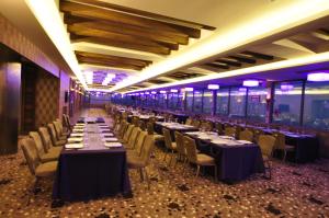 A restaurant or other place to eat at Grand Asya Hotel