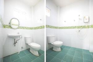 Salle de bains dans l'établissement OYO 676 Kradangnga Resort