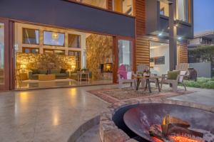 a patio with a fire pit in front of a house at The Haven Montville in Montville