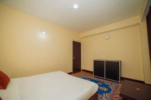 Voodi või voodid majutusasutuse Bambi Farmstay toas