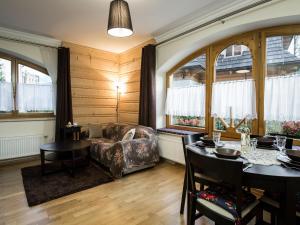 Posedenie v ubytovaní Apartament w Góralskim Domu + 25 fotografií