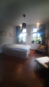 Ένα ή περισσότερα κρεβάτια σε δωμάτιο στο Strandhgårdens BBB rum 1