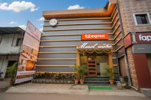 a front of a restaurant with a sign on it at FabExpress Marol Metro in Mumbai