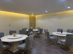 a conference room with tables and chairs in it at Best Western Premier Riyadh in Riyadh +73 photos