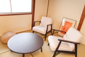 Χώρος καθιστικού στο Cozy Fukui