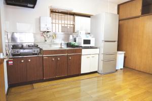 Η κουζίνα ή μικρή κουζίνα στο Cozy Fukui