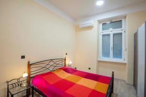 Posteľ alebo postele v izbe v ubytovaní Apartments Villa Adrienne