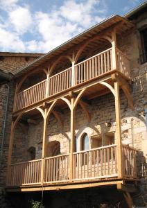 Een balkon of terras bij L'Ancienne Auberge