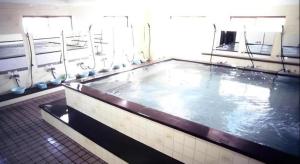 a large pool of water in a swimming pool at Okinawa Sunplaza Hotel in Naha