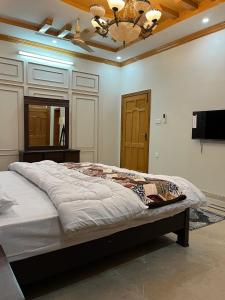 TV a/nebo společenská místnost v ubytování SereneNest