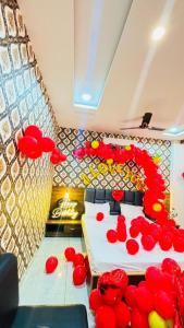 Postel nebo postele na pokoji v ubytování Hotel Nandini