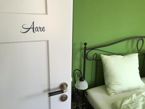 Postel nebo postele na pokoji v ubytování BnB Hopfengrün Langenthal