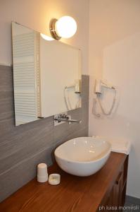 Koupelna v ubytování Residence Orma + 35 fotografií