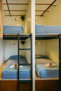 Postel nebo postele na pokoji v ubytování Blue monkey - Bouldering Guesthouse