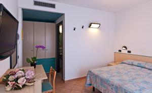 TV a/nebo společenská místnost v ubytování Hotel Prestige