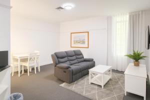 Χώρος καθιστικού στο Anzac Executive Apartments Brisbane