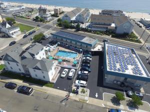an aerial view of a city with a swimming pool at Sand Pebble Motor Lodge in Point Pleasant Beach