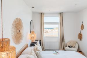 Postel nebo postele na pokoji v ubytování Harbour View House