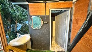 a bathroom with a sink and a mirror at Akimebonphuresort in Ban San Pu Loei (2) +72 photos