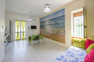 Et tv og/eller underholdning på Casa Vacanze L'Onda