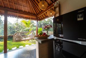 Kuchyň nebo kuchyňský kout v ubytování Sunrise Swing Paradise