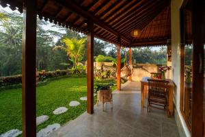 Zahrada ubytování Sunrise Swing Paradise