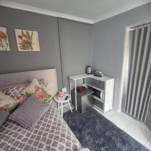 Ένα ή περισσότερα κρεβάτια σε δωμάτιο στο White Lilly