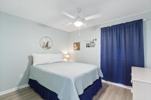 Ένα ή περισσότερα κρεβάτια σε δωμάτιο στο Plantation 4407